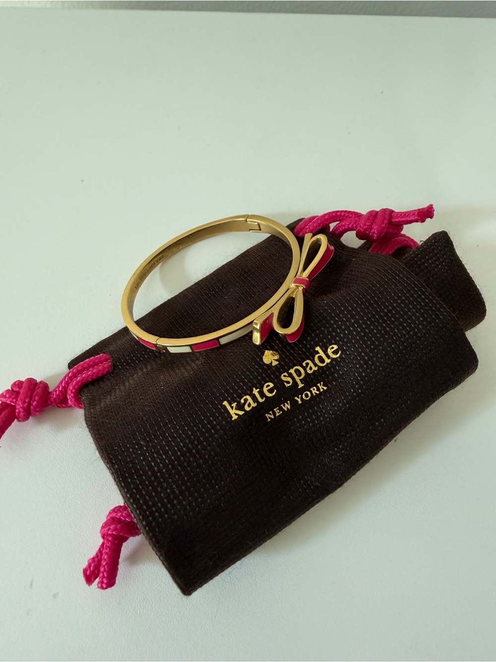 kate spade gold and hot pink bow bangle bracelet